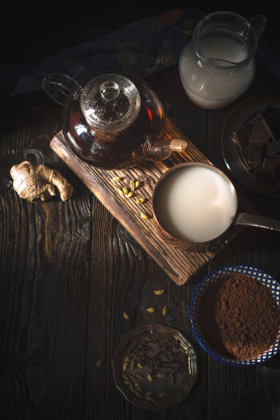 istock Still life with ingredients for chocolate truffles on  wooden table 827632720