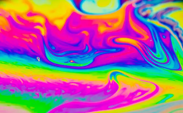 Photo of Rainbow colors created by soap, bubble