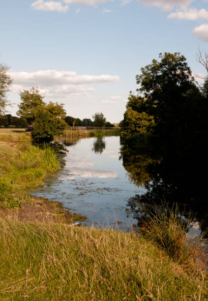 istock sunset soft light highlighting the river stour running through the country in dedham 827642722