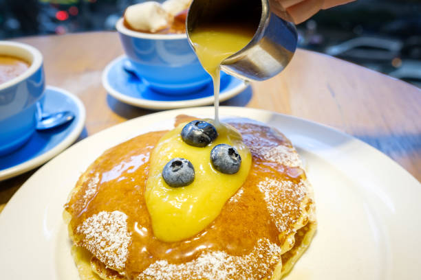 istock Blueberry Pancake Poured by Lemon Sauces On top 827642884