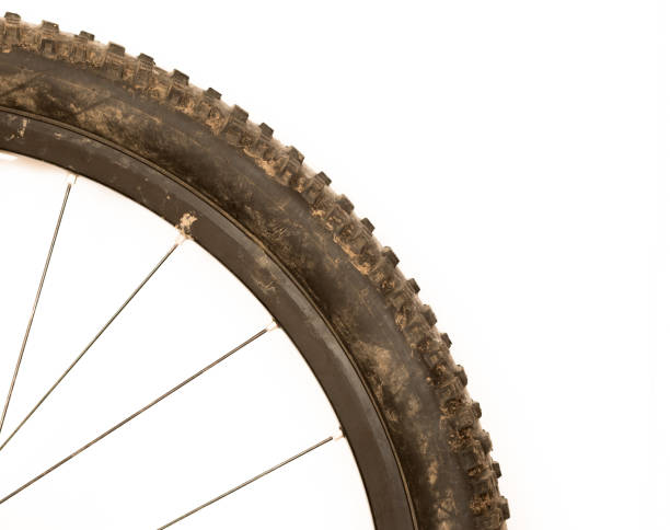 close up of a dirty mountain bike tyre corner