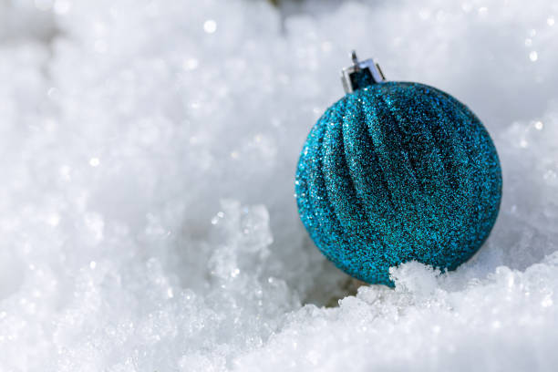 istock christmas ball in the snow 827650716