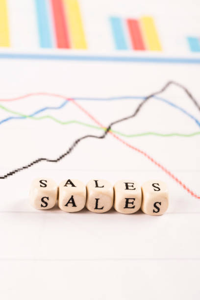 istock Financial analysis graphs on desk. Sales written 827651756