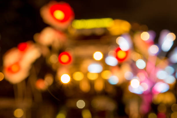 istock Singapore city night lights bokeh blurred background 827651894