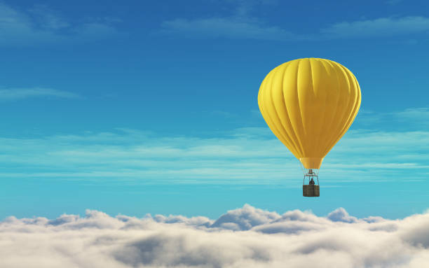 istock Man in a hot air balloon yellow on a blue sky. 827654338
