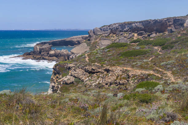 istock Trail in the Cliffs on the beach,  Vila Nova de Milfontes 827657894