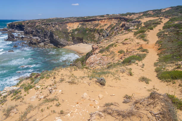 istock Cliffs on the beach,  Vila Nova de Milfontes 827658136