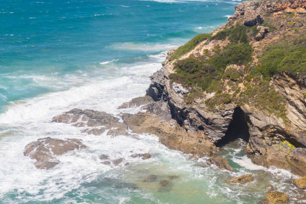 istock Cave in the Cliffs on the beach,  Vila Nova de Milfontes 827658598
