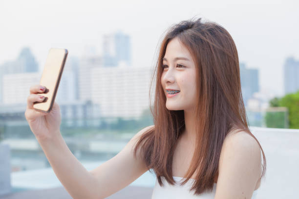 istock Woman using smart phone 827661860