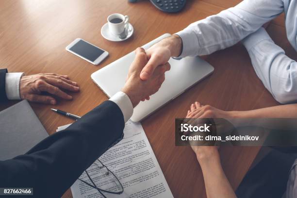 Young Couple Purchase Rent Property Real Estate Stock Photo - Download Image Now - Office, Customer, Handshake