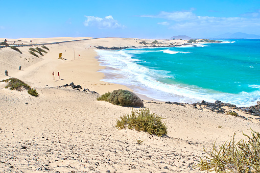 Amazing color in the water in a windy day at Fuerteventura, Corralejo is a north eastern location in the island famous for the wind, and the amazing sand dunes.