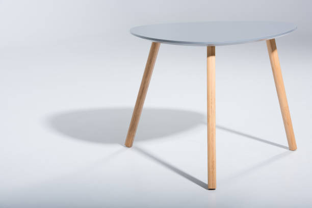 istock stylish stool with white top and light wooden legs standing on white 827668086