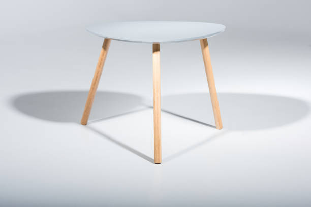 istock stylish stool with white top and light wooden legs standing on white 827669444