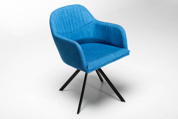 istock stylish chair with blue fabric top and triangular metallic legs on white 827670794