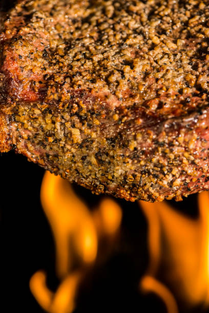 istock Beef Rump Roast with dry rub on rotisserie 827671038