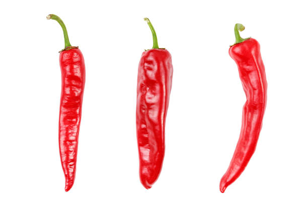 A lot of red hot chili pepper isolated on white background