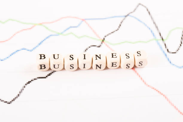 istock Financial analysis graphs on desk. Business written 827687348