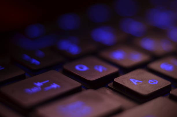 Close up. Blue backlight, backlit on laptop or keyborad computer of gaming in the dark. Computer laptop keyboard with Blue dark backlight, backlit in the dark. Concept computer Close up. Blue backlight, backlit on laptop or keyborad computer of gaming in the dark. Computer laptop keyboard with Blue dark backlight, backlit in the dark. Concept computer. keyborad stock pictures, royalty-free photos & images