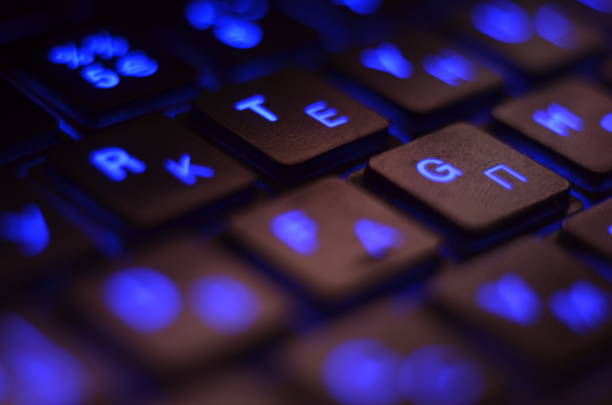 Close up. Blue backlight, backlit on laptop or keyborad computer of gaming in the dark. Computer laptop keyboard with Blue dark backlight, backlit in the dark. Concept computer Close up. Blue backlight, backlit on laptop or keyborad computer of gaming in the dark. Computer laptop keyboard with Blue dark backlight, backlit in the dark. Concept computer. keyborad stock pictures, royalty-free photos & images