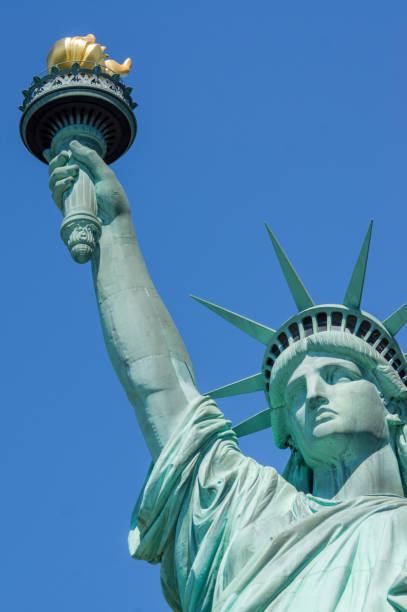 istock Statue of Liberty Face, Arm and Torch 827690964