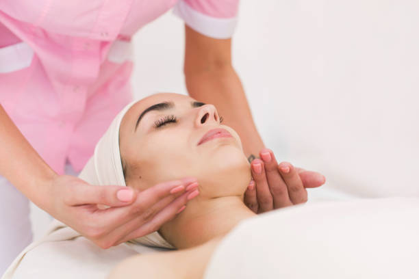 istock Massage face girl 827692948