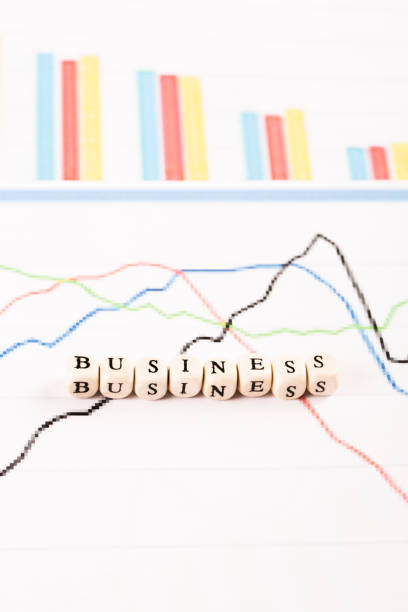 istock Financial analysis graphs on desk. Business written 827695522