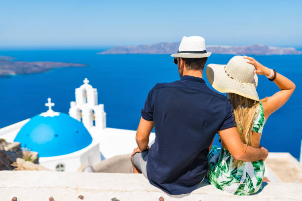 istock Happy young couple on Santorini island, Greece 827699850