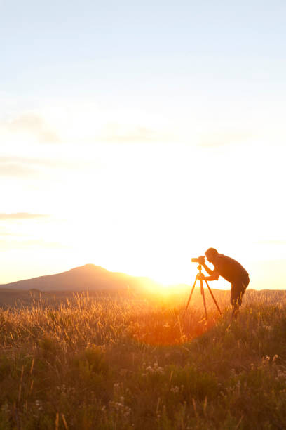 istock Photographer at Sunset 827708812