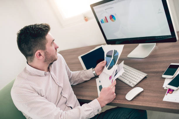 istock Busy Businessman Working on Computer in Modern Office 827709110
