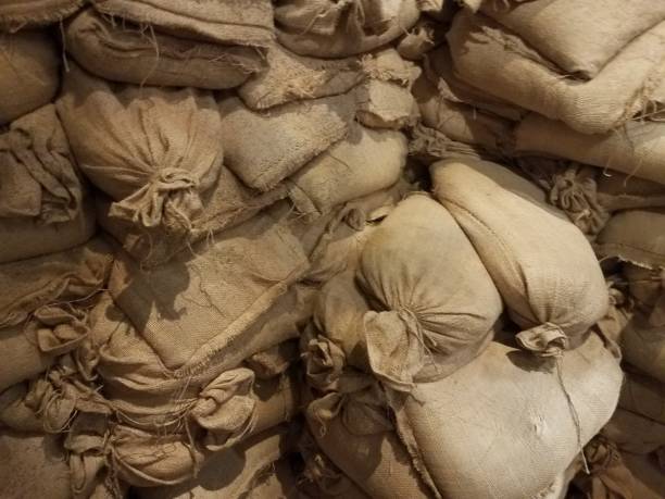 istock wall of sandbags 827710030
