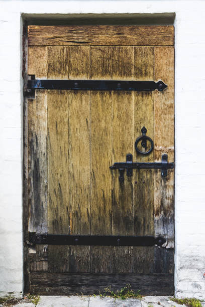 istock Ancient wooden door 827714810