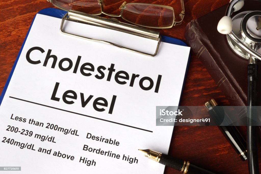 Cholesterol level chart on a table. Medical concept. Cholesterol Stock Photo