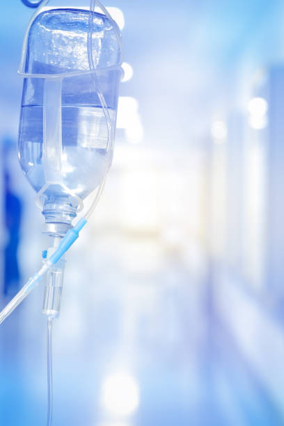 istock Medical drop counter in the background brightly lit corridor 827729642