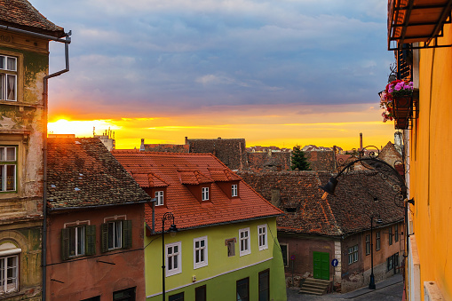 Scenery of sunset in old european medieval city Sibiu, Romania.