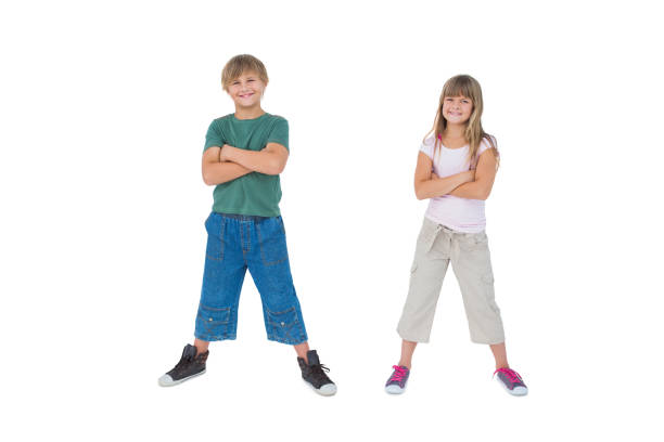 istock Smiling children with their arms crossed 827740310