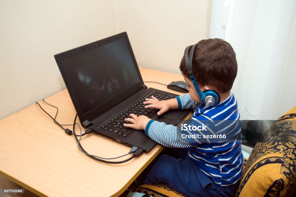 Boy Images Computer Cute Boy In Computer Game Stock Photo - Download Image Now - Adult ...