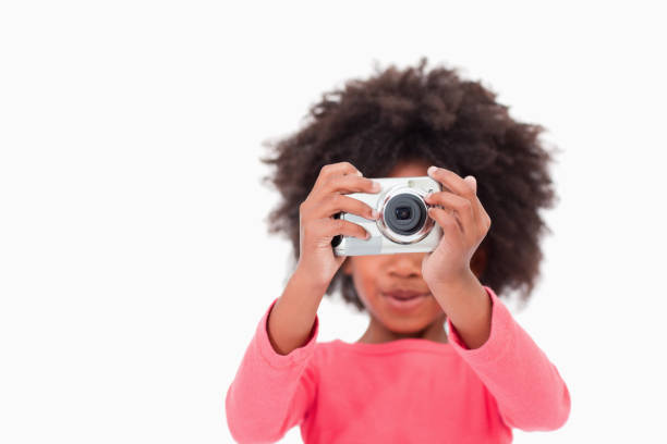 istock Happy girl taking a picture 827751690