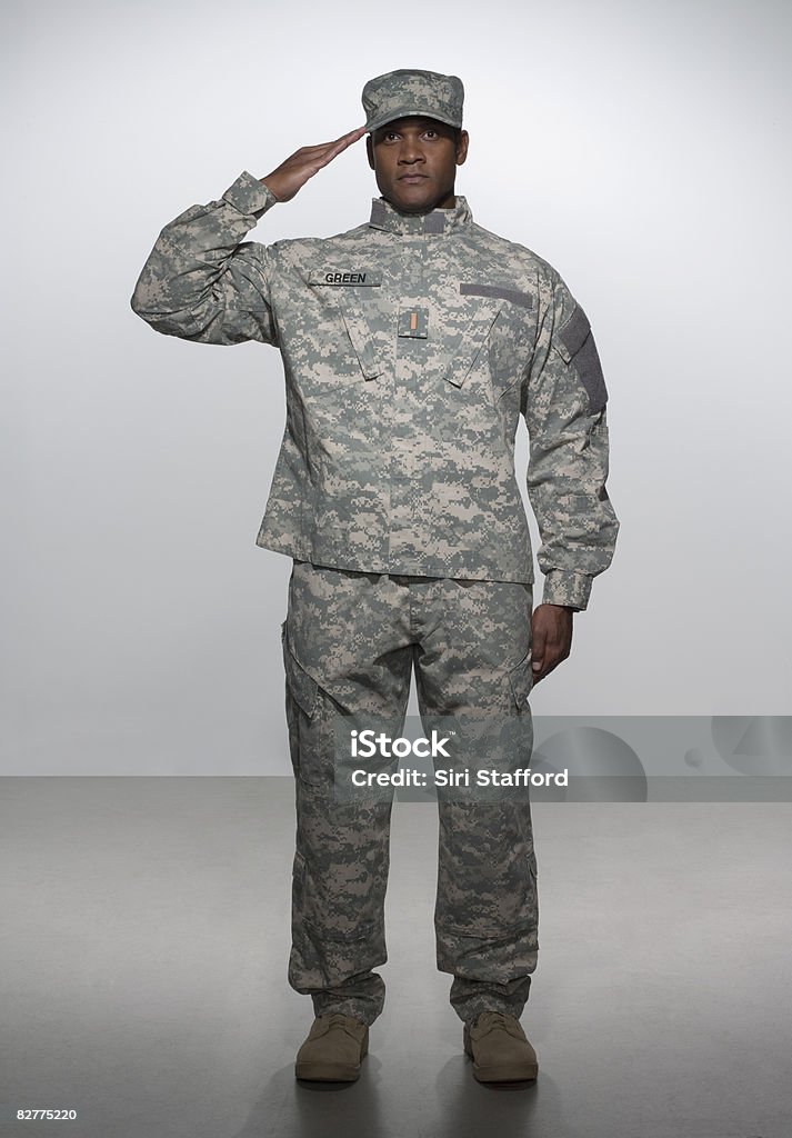 man in military uniform, saluting  Army Soldier Stock Photo