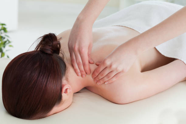 istock Redhaired woman having a rolling massage 827775952