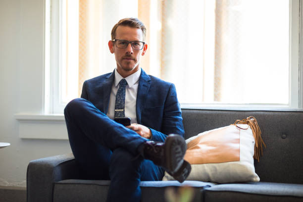 istock Relaxing Businessman Looking at Camera 827780554