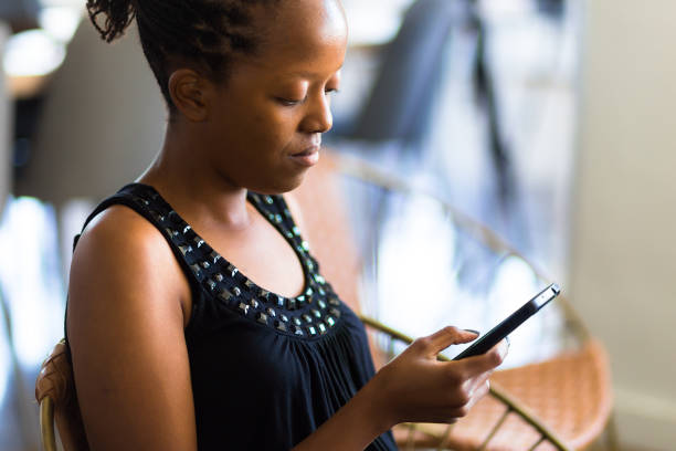 istock Woman Looking at Cellphone 827780828