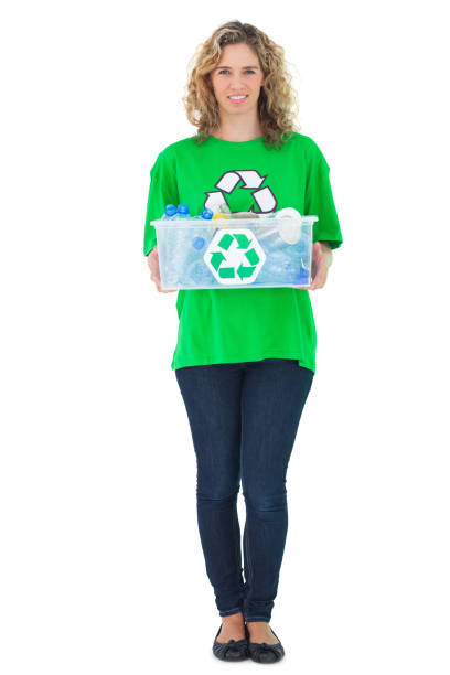 istock Cheerful environmental activist holding recycling box 827783404