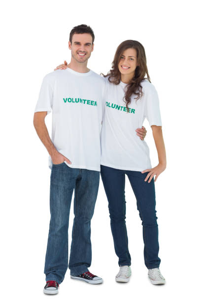 istock Two young people wearing volunteer tshirt 827783500