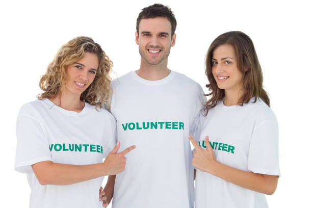istock Group of volunteers pointing their tshirt 827783564
