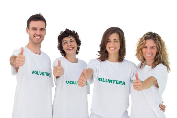 istock Cheerful group of volunteers giving thums up 827783628