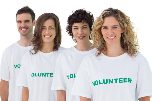 istock Four people wearing volunteer tshirt 827783638