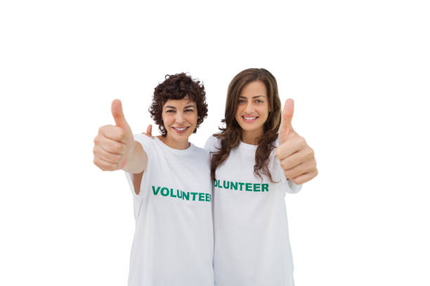 istock Two happy volunteers giving thumbs up 827783842