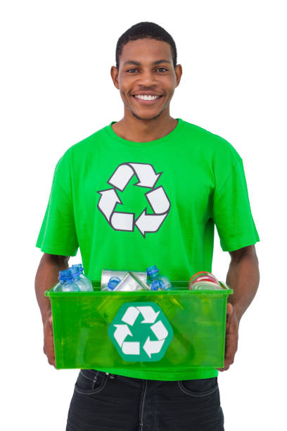 istock Man holding box of recyclables 827792784