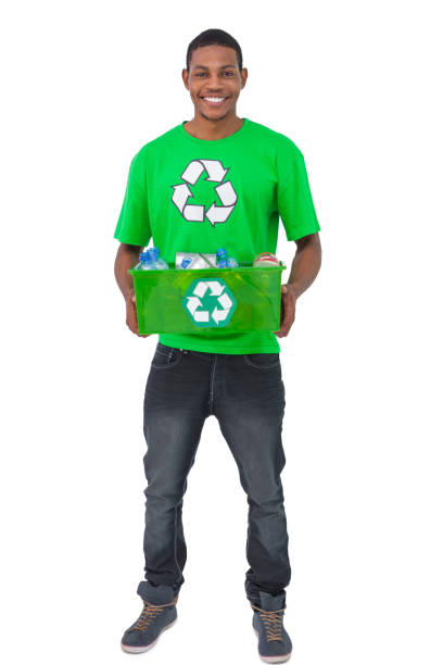 istock Smiling man holding box of recyclables 827792788