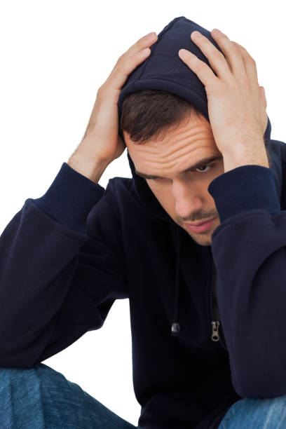istock Portrait of depressed man with head in hands 827792970